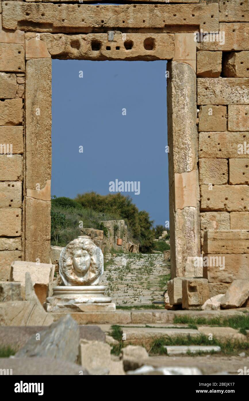 Mythologigal Medusa hed at Severan Forum, Roman ruins in Leptis Magna. Unesco World Heritage, Libya Stock Photo