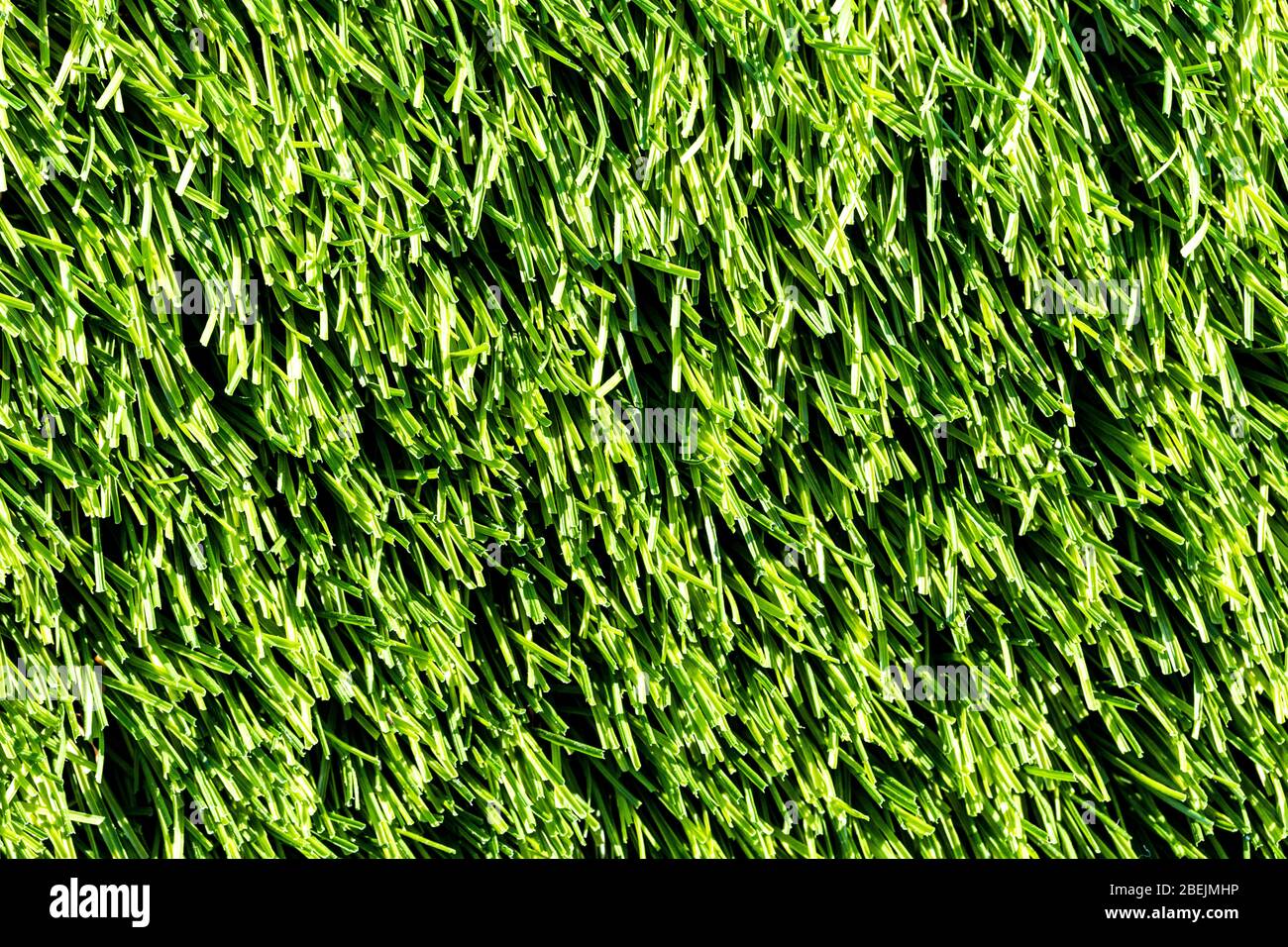 Artificial green grass or needles texture. Abstract background for design. Stock Photo