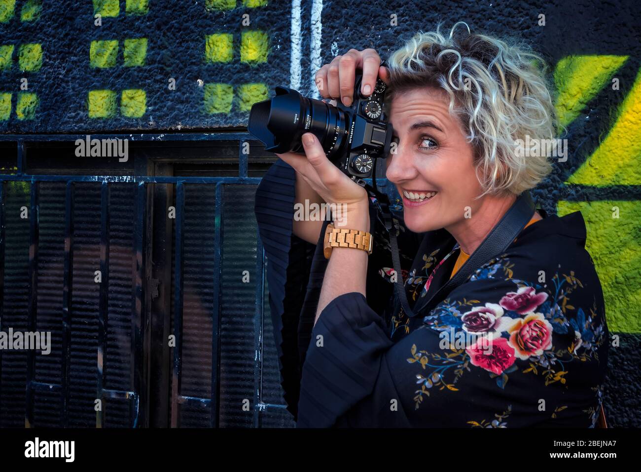 Model posing with DSLR Camera Stock Photo - Alamy