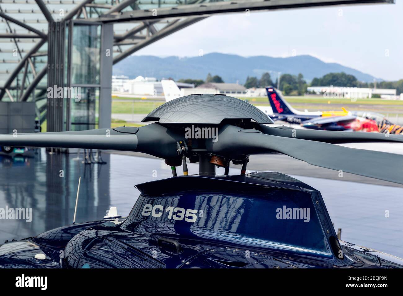 Salzburg / Austria - August 2019: Rotor blades of the helicopter in Red Bull Hangar-7, a modern glass and steel building hosting a collection of histo Stock Photo