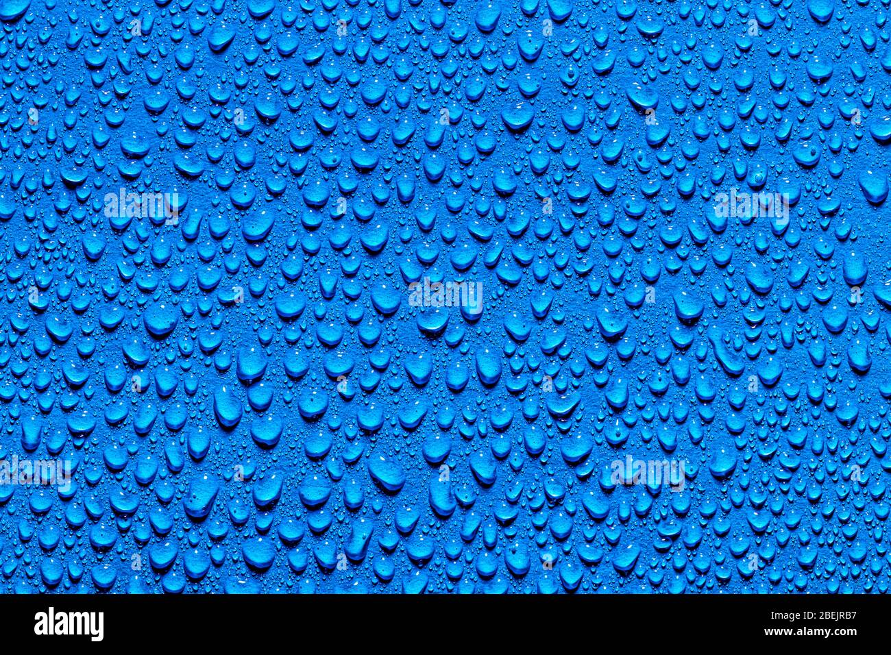 Macro water drops texture on a blue background. Abstract pattern or ...
