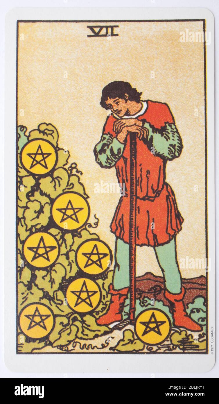 A single tarot card, the seven of Pentacles used for fortune telling Stock  Photo - Alamy