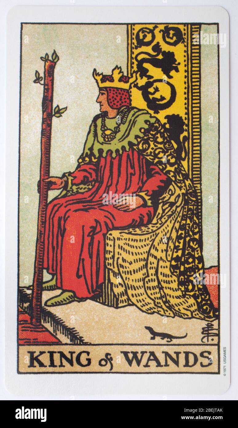 A single tarot card, The King of Wands used for fortune telling. Stock Photo