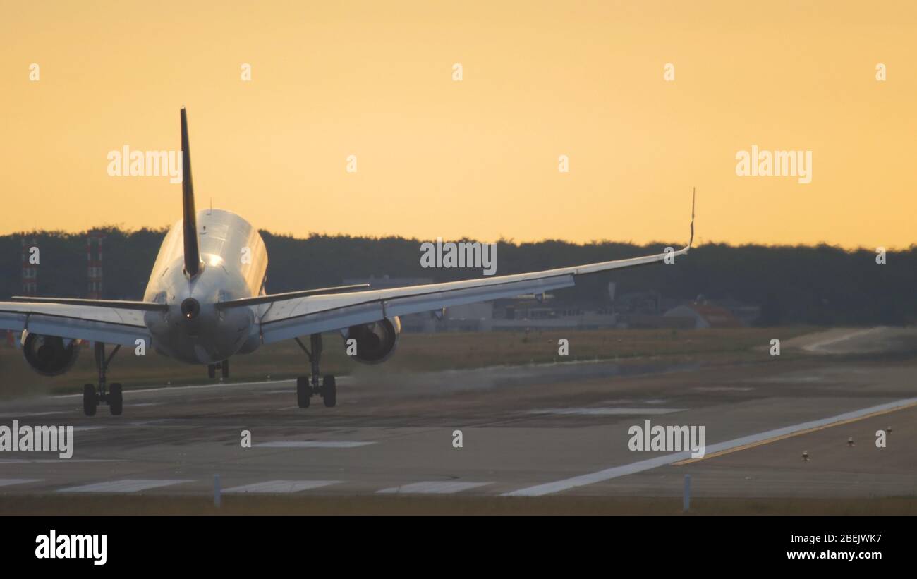 Aircaft landing at the early morning Stock Photo