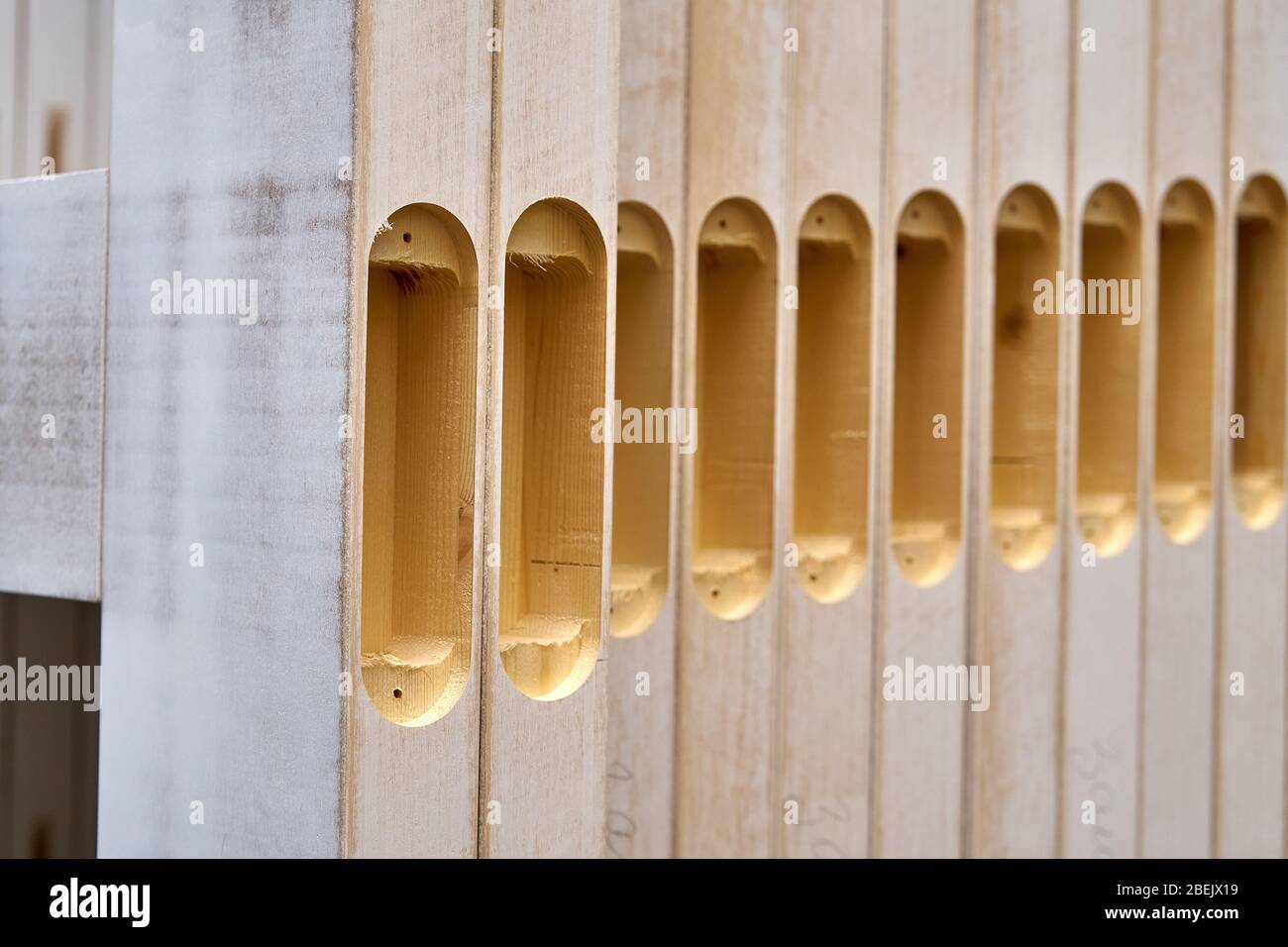 Joinery. Stacked door leafs. Wood door manufacturing process. Woodworking and carpentry production. Furniture manufacture. Close-up Stock Photo