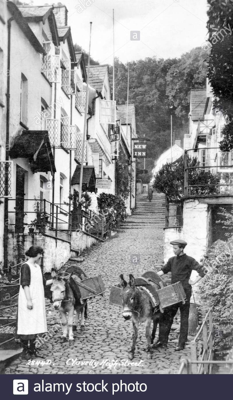 Clovelly village High Street, Devon, England, vintage postcard from 1920 Stock Photo