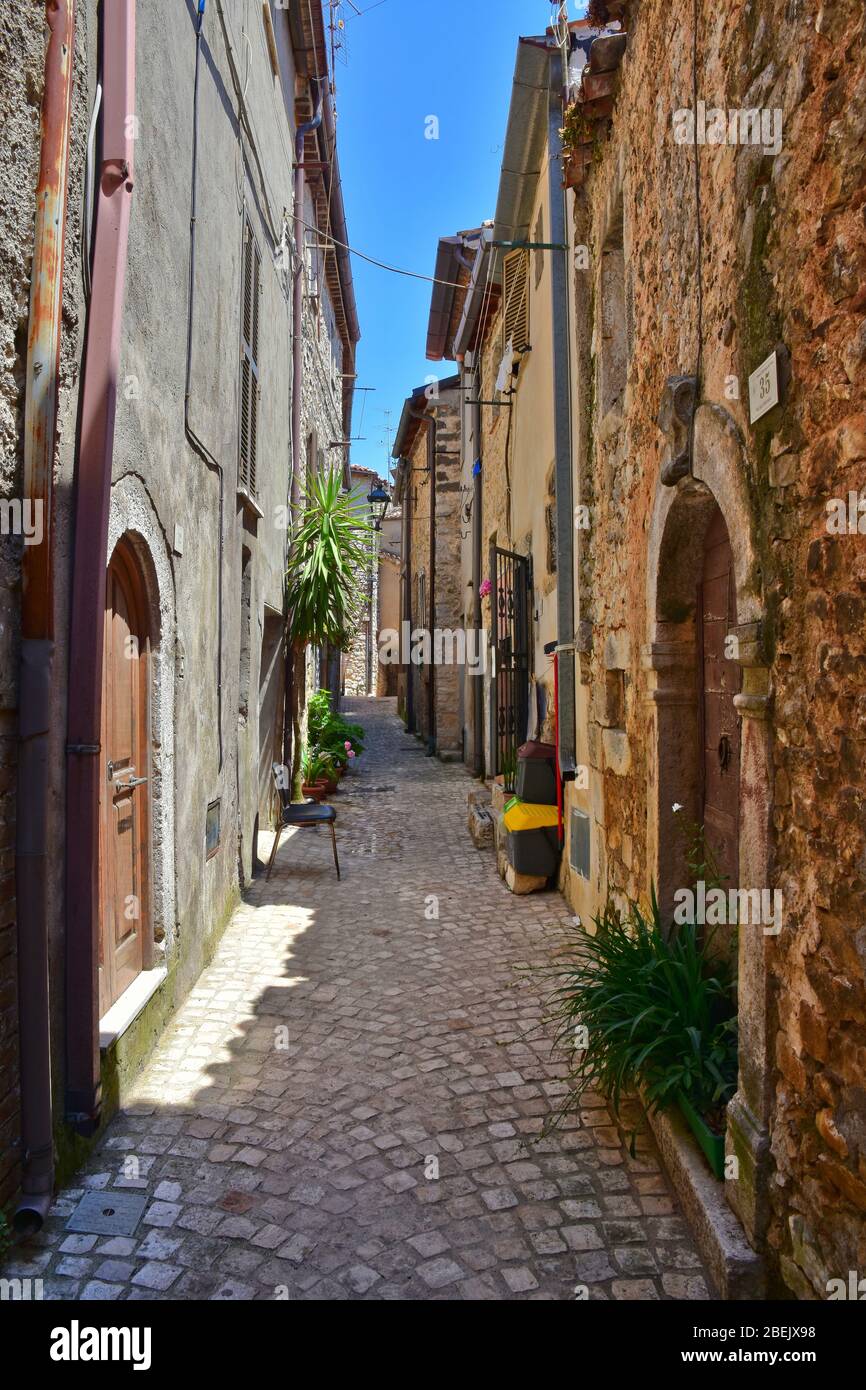 A narrow street between the old houses of Roccasecca dei Volsci, Italy Stock Photo