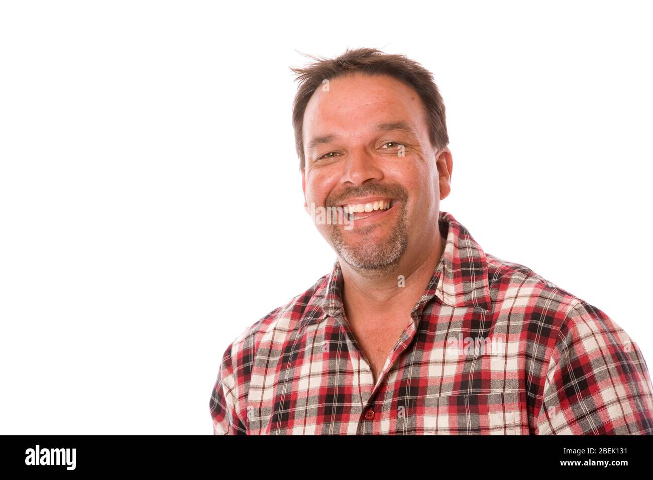 A portrait of a normal middle aged guy on white. Stock Photo