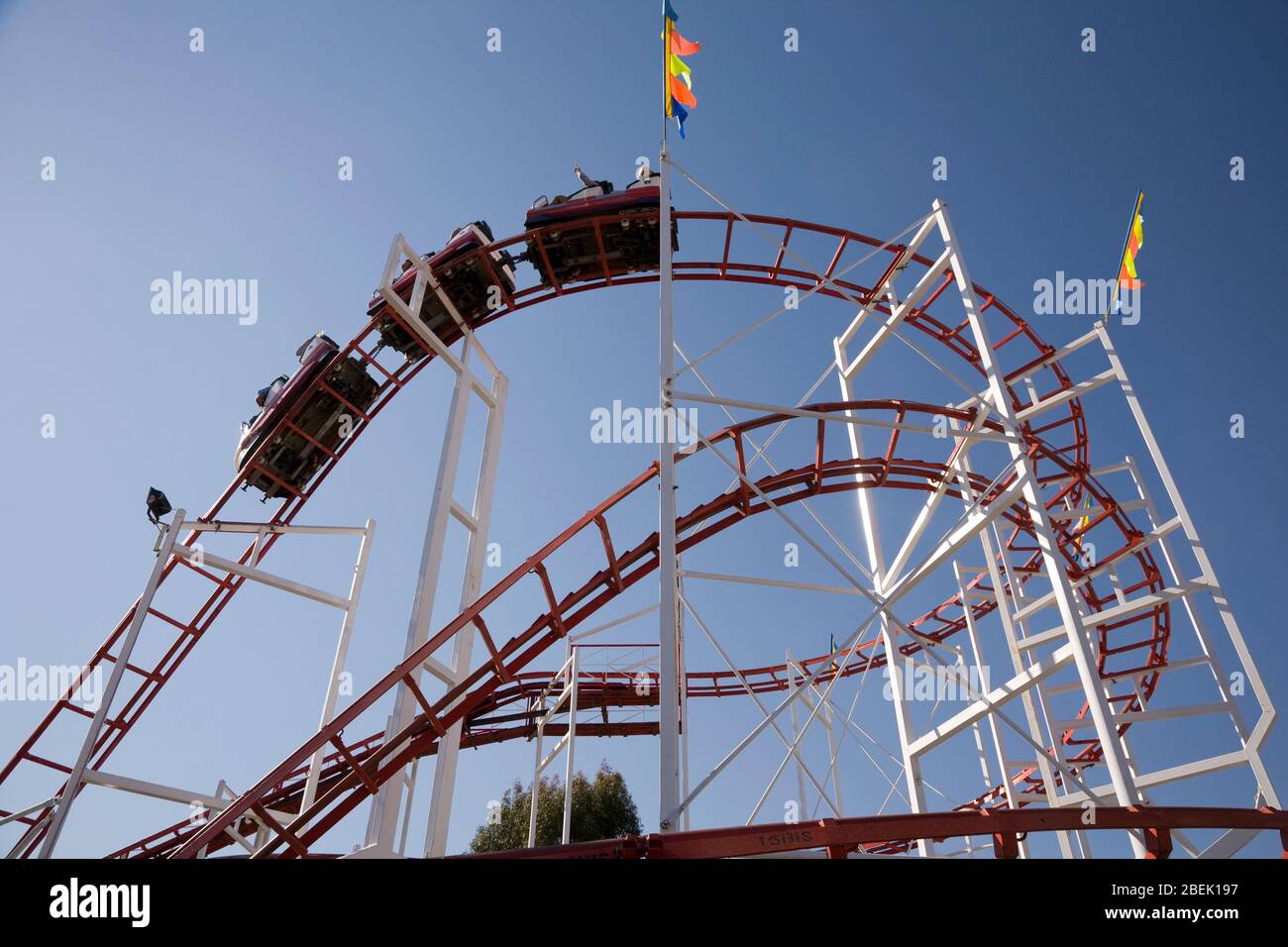 A small roller coaster at a carnival. Stock Photo
