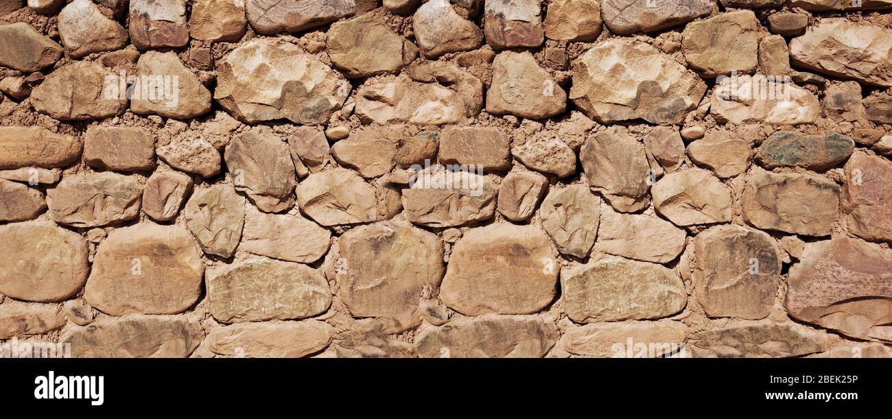 Old rough stone wall, banner background wallpaper Stock Photo - Alamy