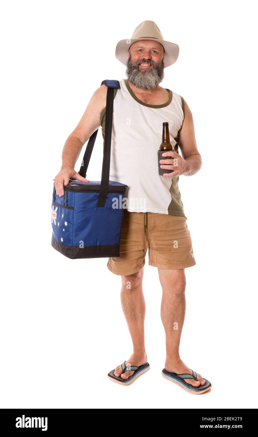 An Aussie guy with a beer and an esky, wearing traditional thongs. Stock Photo