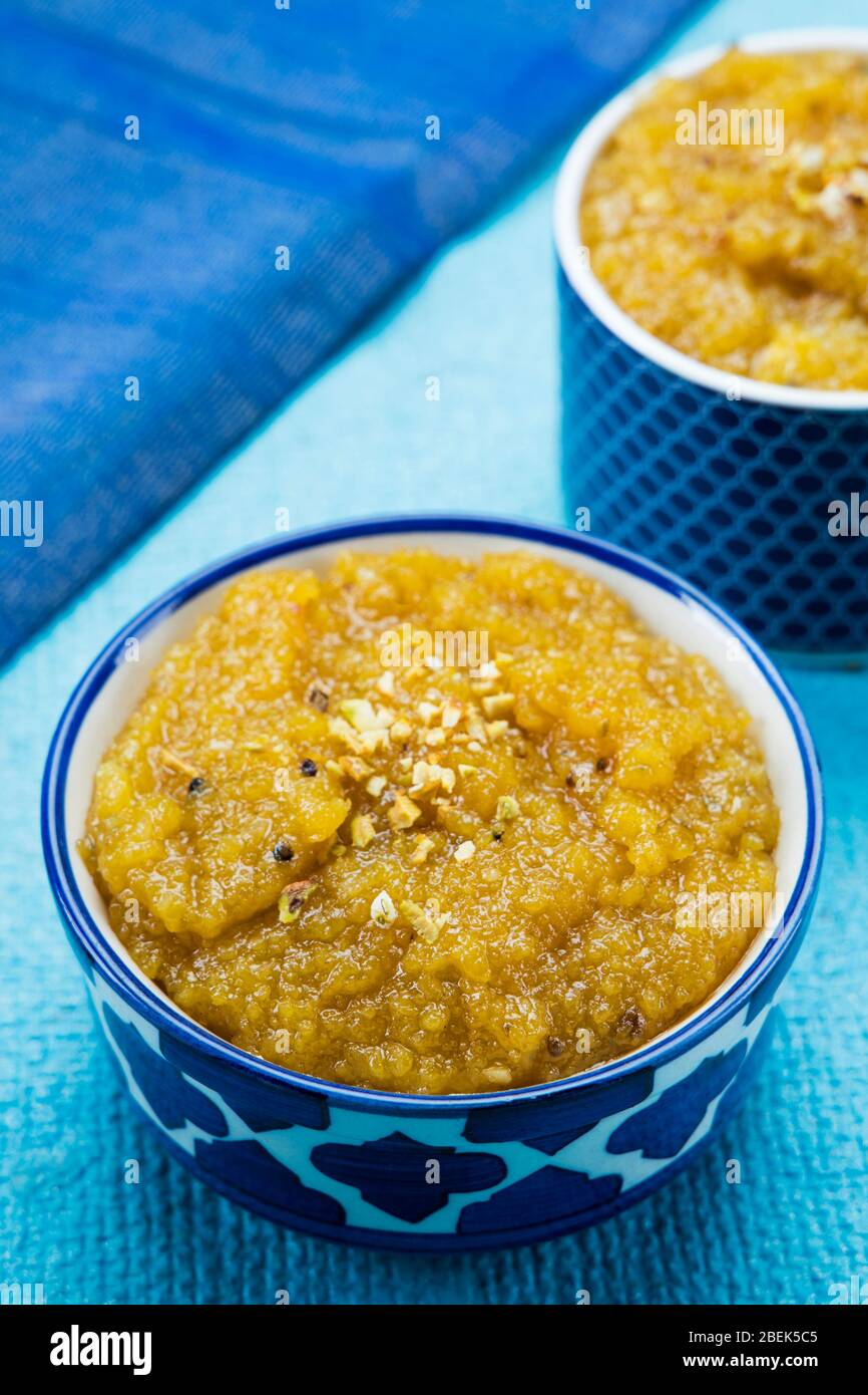 Delicious moong dal halwa kept in bowls on a table. Stock Photo