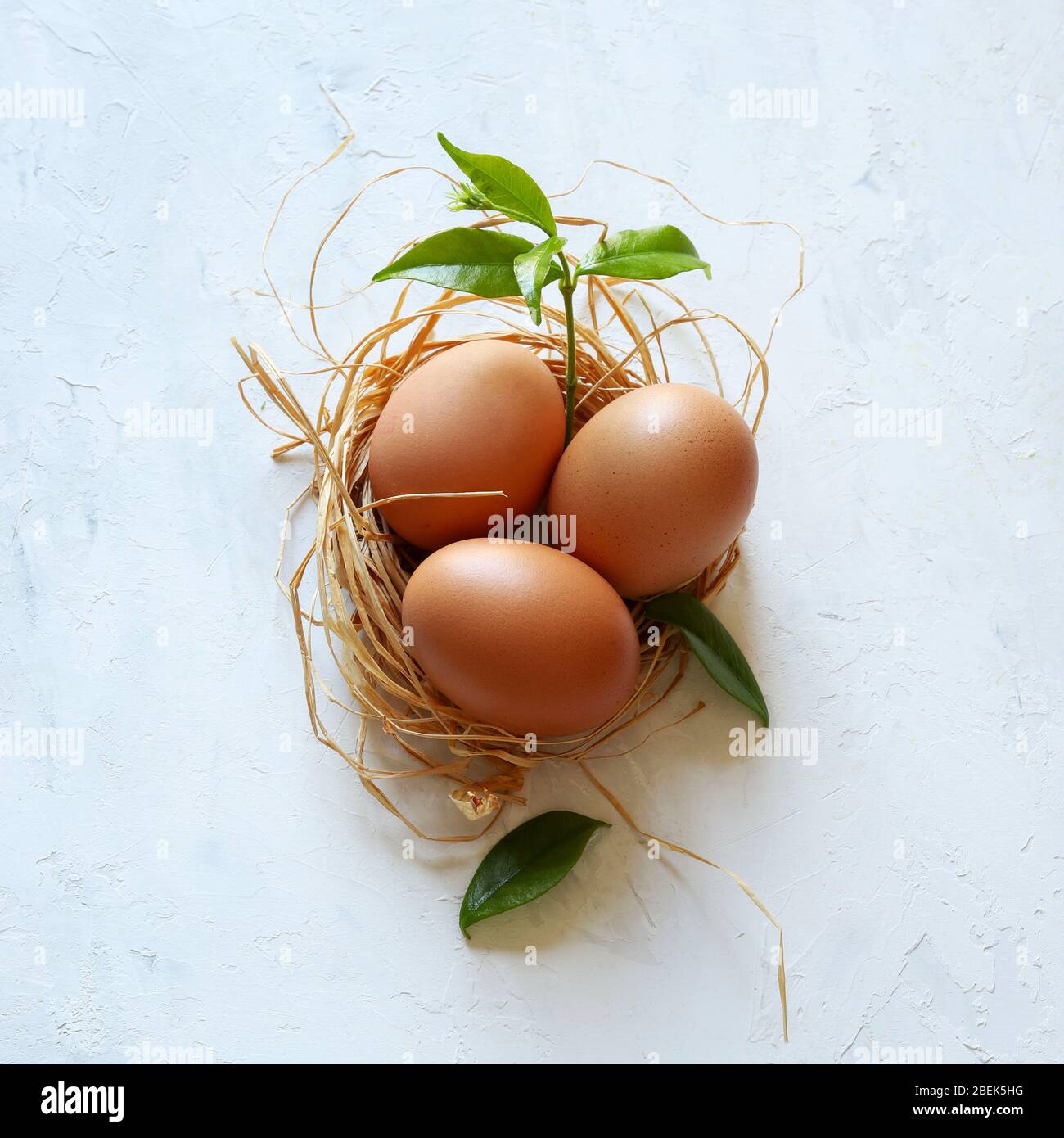 Healthy food concept. Three chicken eggs isolated on white background. Top view. Stock Photo