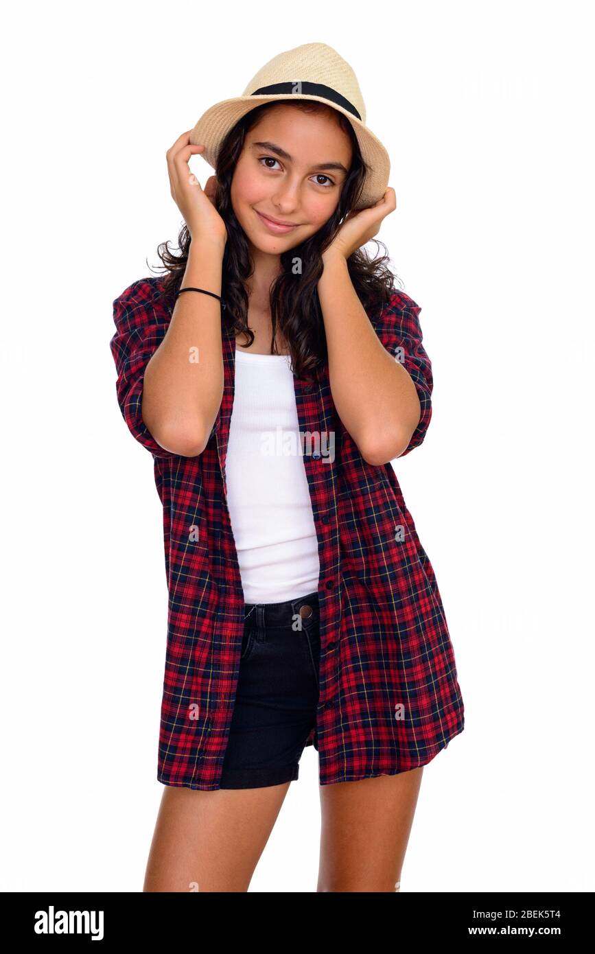 Studio shot of young beautiful teenage girl isolated against white background Stock Photo