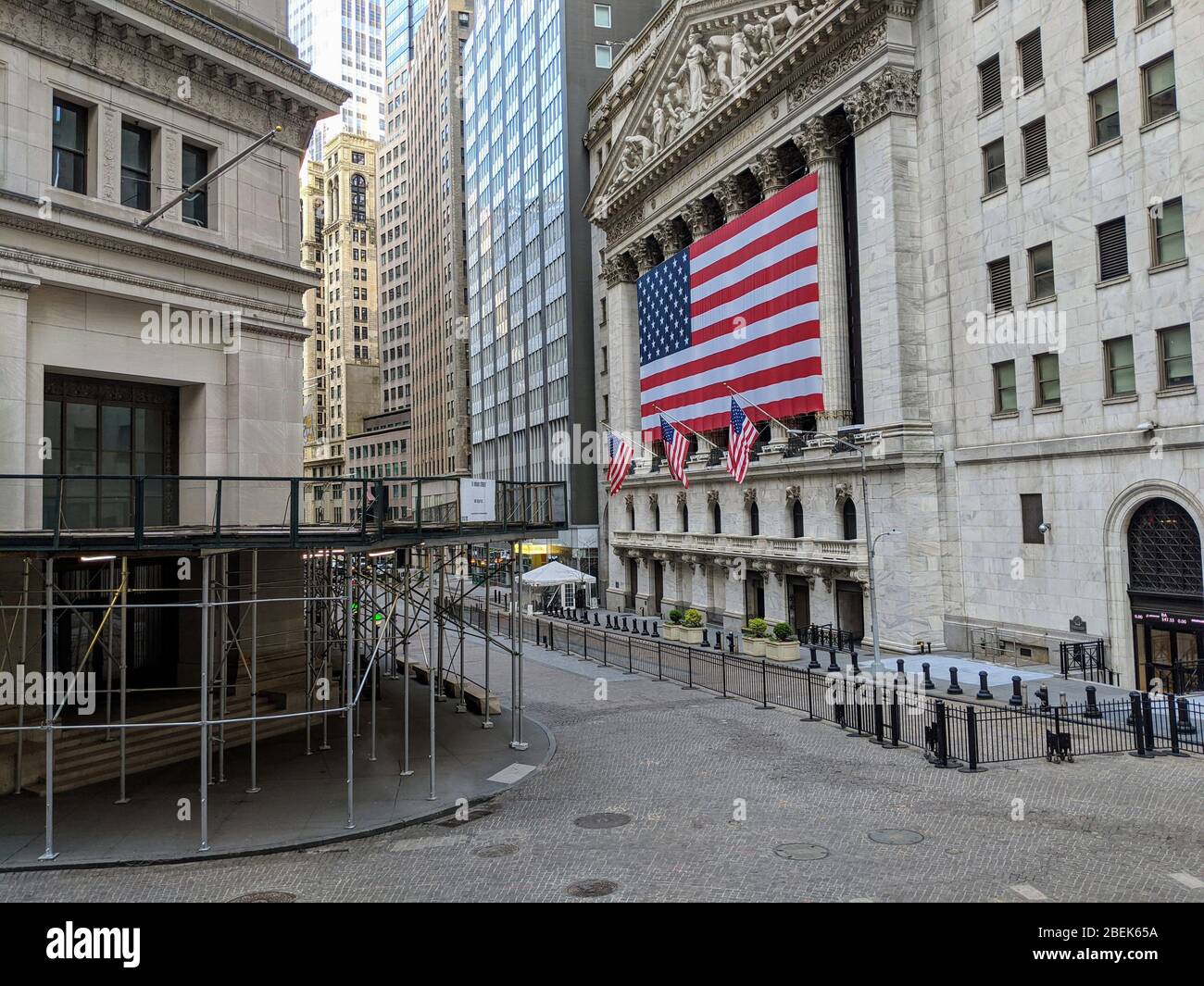 Empty streets around the New York Stock Exchange during the coronavirus pandemic in Lower Manhattan. Stock Photo