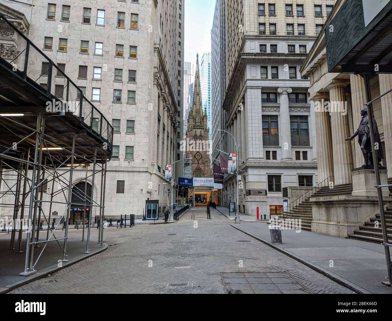 View of an empty Wall Street during the coronavirus pandemic in New  York City. Stock Photo