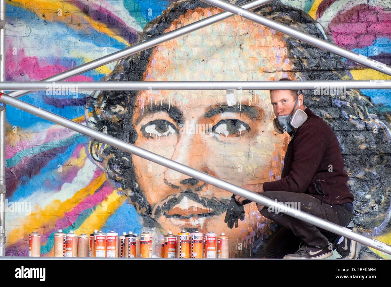 The Australian street artist Jimmy C (James Cochran) working on his public street art portrait of Shakespeare in 2016. Clink Street, London Stock Photo