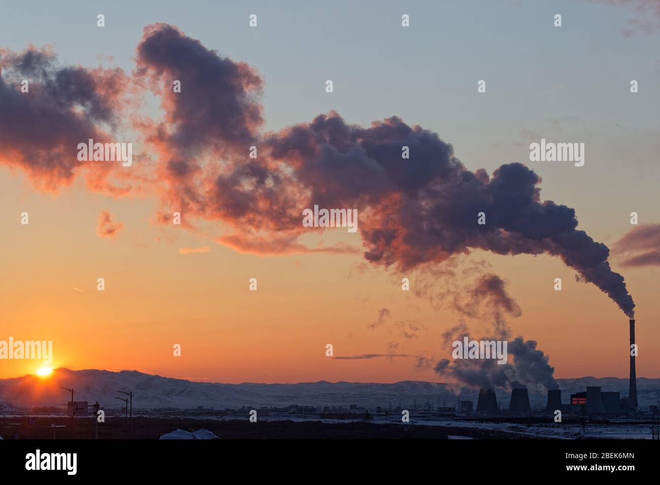 Fume of thermic factories at sunset Stock Photo