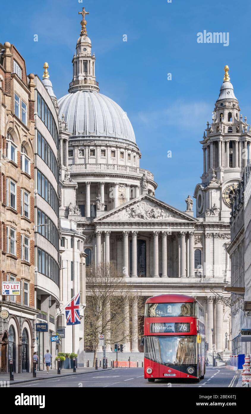 UK, London, Ludgate Hill. A red London bus in front of St. Paul's cathedral Stock Photo