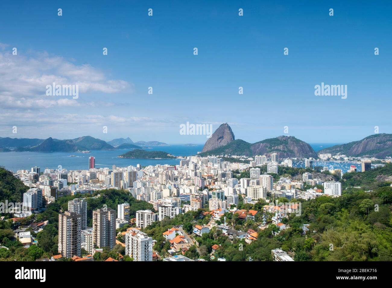 South America, Brazil, Rio de Janeiro. View of the Botafogo residential neighbourhood with Sugar Loaf mountain and Guanabara Bay behind Stock Photo