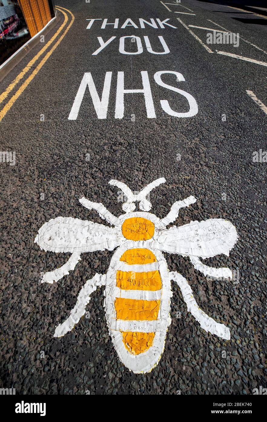 A worker bee, the symbol of Manchester is seen painted onto the floor with a message Thank You NHS outside the new NHS Nightingale North West hospital inside Manchester Central, Manchester which is open for patients as the UK continues in lockdown to help curb the spread of the coronavirus. PA Photo. Picture date: Tuesday April 14, 2020. See PA story HEALTH Coronavirus. Photo credit should read: Peter Byrne/PA Wire Stock Photo