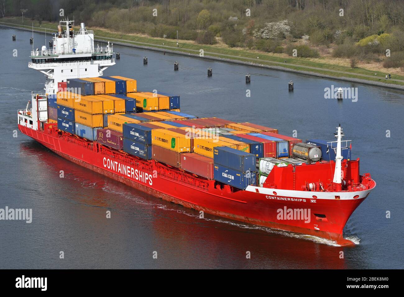 Containerships VI passing the Kiel Canal Stock Photo