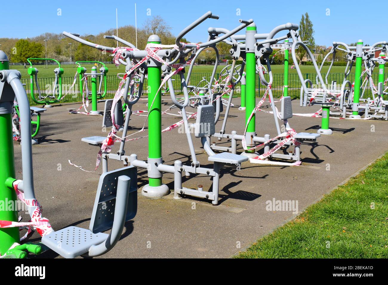 Outdoor kids play areas gyms fenced off by the London council. Government called for leisure facilities to close following social distancing measures. Stock Photo