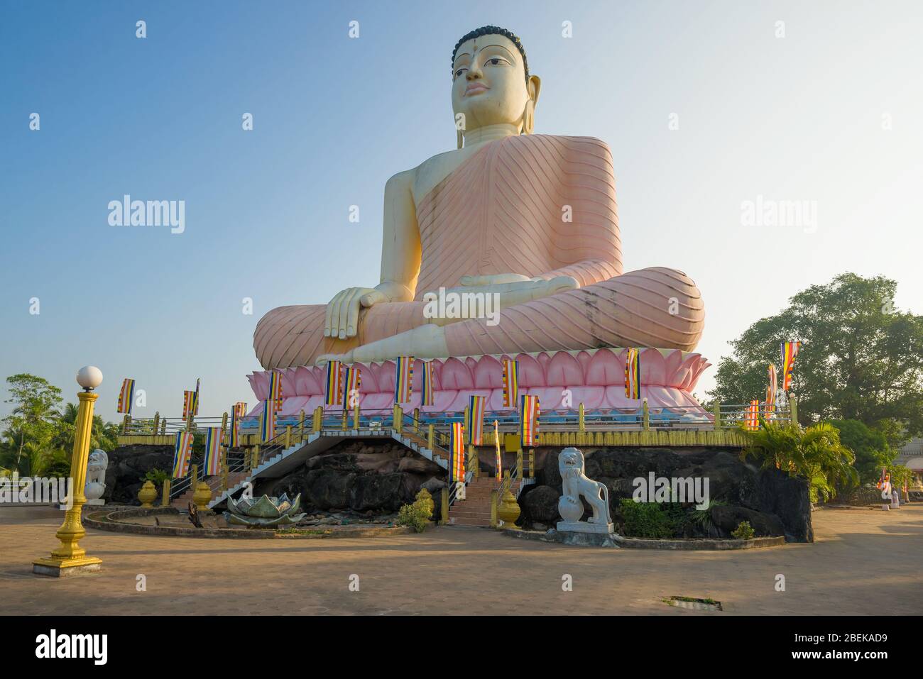 ALUTHGAMA, SRI LANKA - FEBRUARY 16, 2020: View of a giant sculpture of a seated Buddha in the Buddhist temple of Kande Viharaya Temple Stock Photo