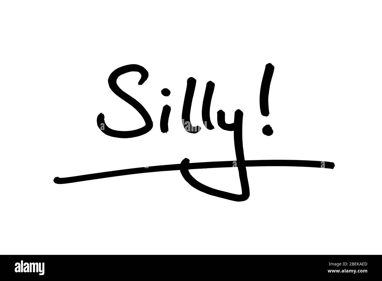 The word Silly! handwritten on a white background. Stock Photo
