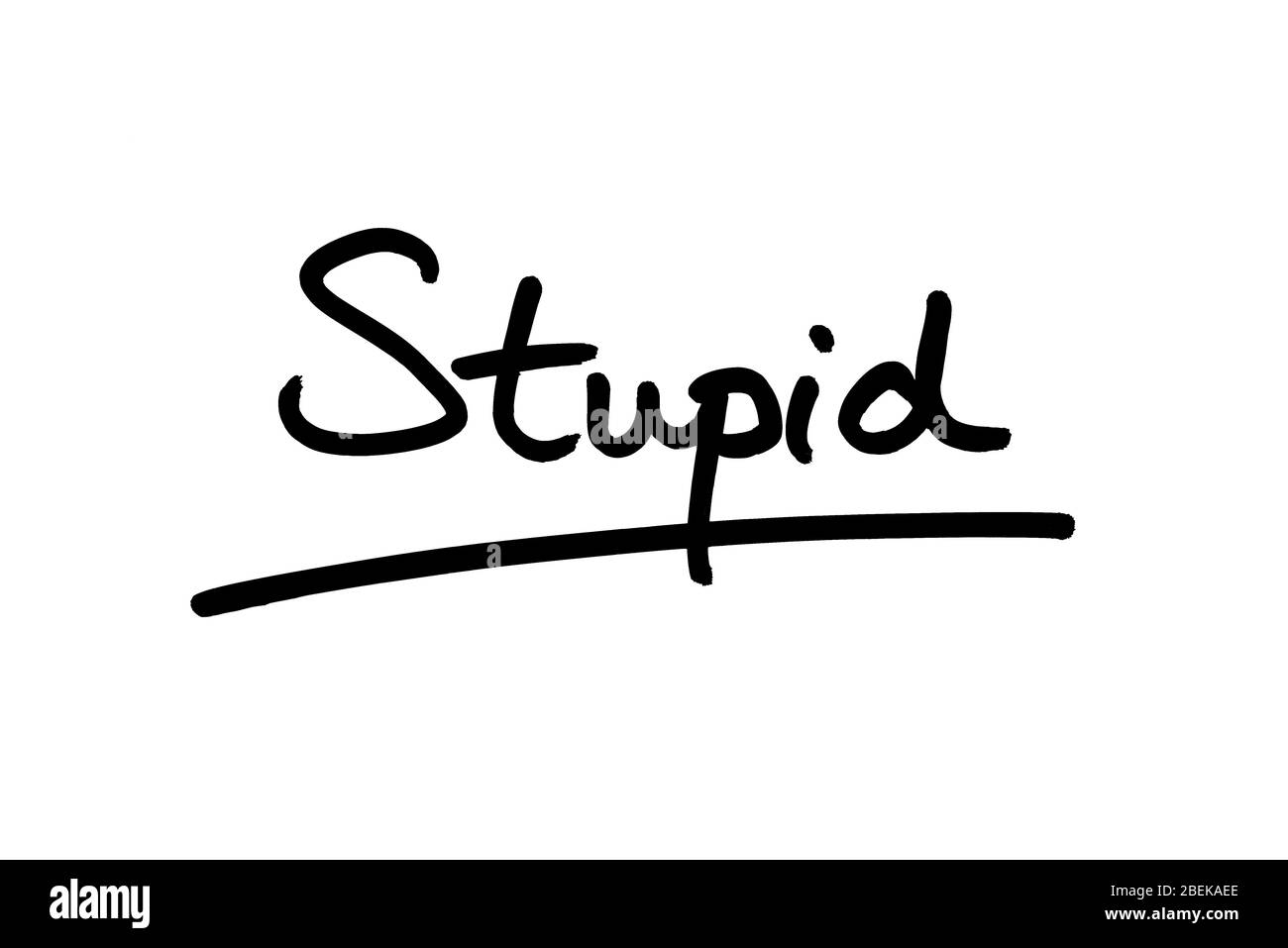 The word Stupid handwritten on a white background. Stock Photo