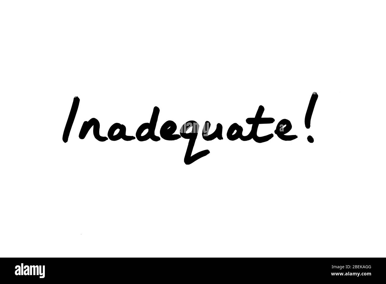 Inadequate! handwritten on a white background. Stock Photo