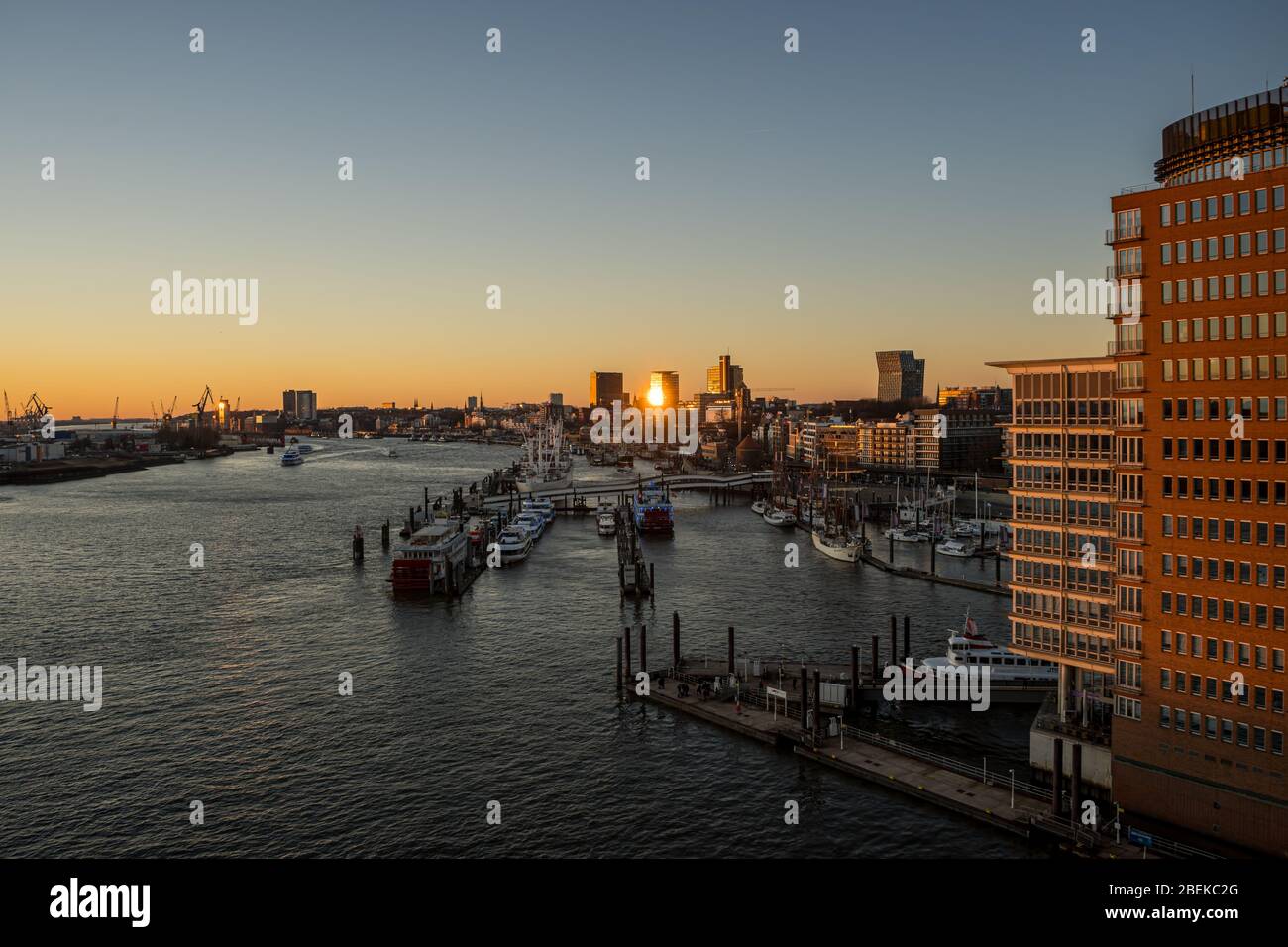 Panoramic view of the Port of Hamburg in the Hafen City at Elbe river at sunset/twilight Stock Photo