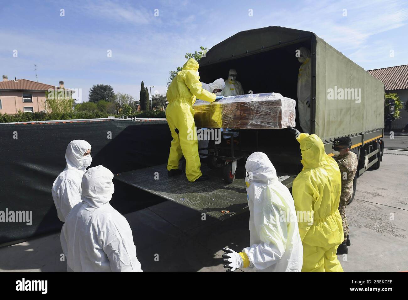 Italy, Lombardy region, Ponte San Pietro (Bergamo), April 13, 2020 : Coronavirus emergency, Covid-19. Men of Protezione Civile take the coffins in a d Stock Photo
