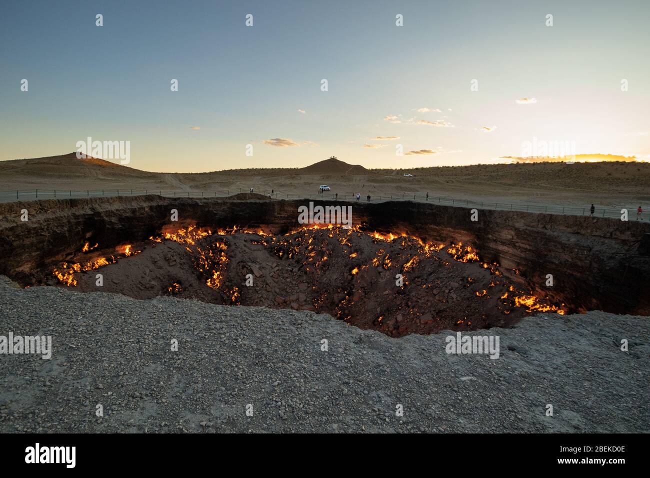 Sunset at the Darvasa Crater, also known as the Doorway to Hell, the flaming gas crater in Darvaza (Darvasa), Turkmenistan Stock Photo