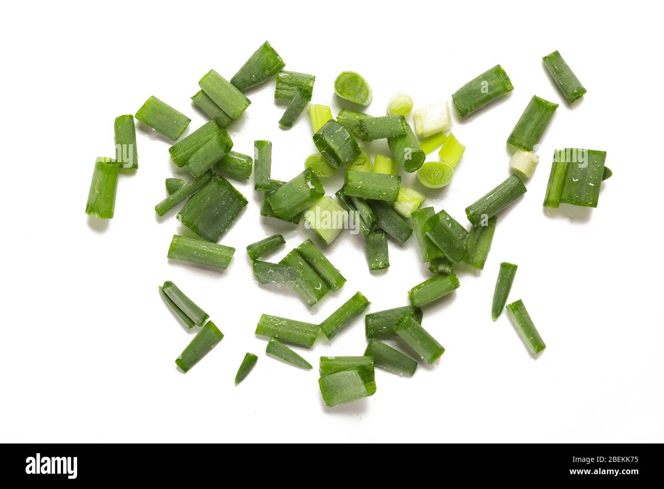 chopped green onions isolated on white background Stock Photo - Alamy