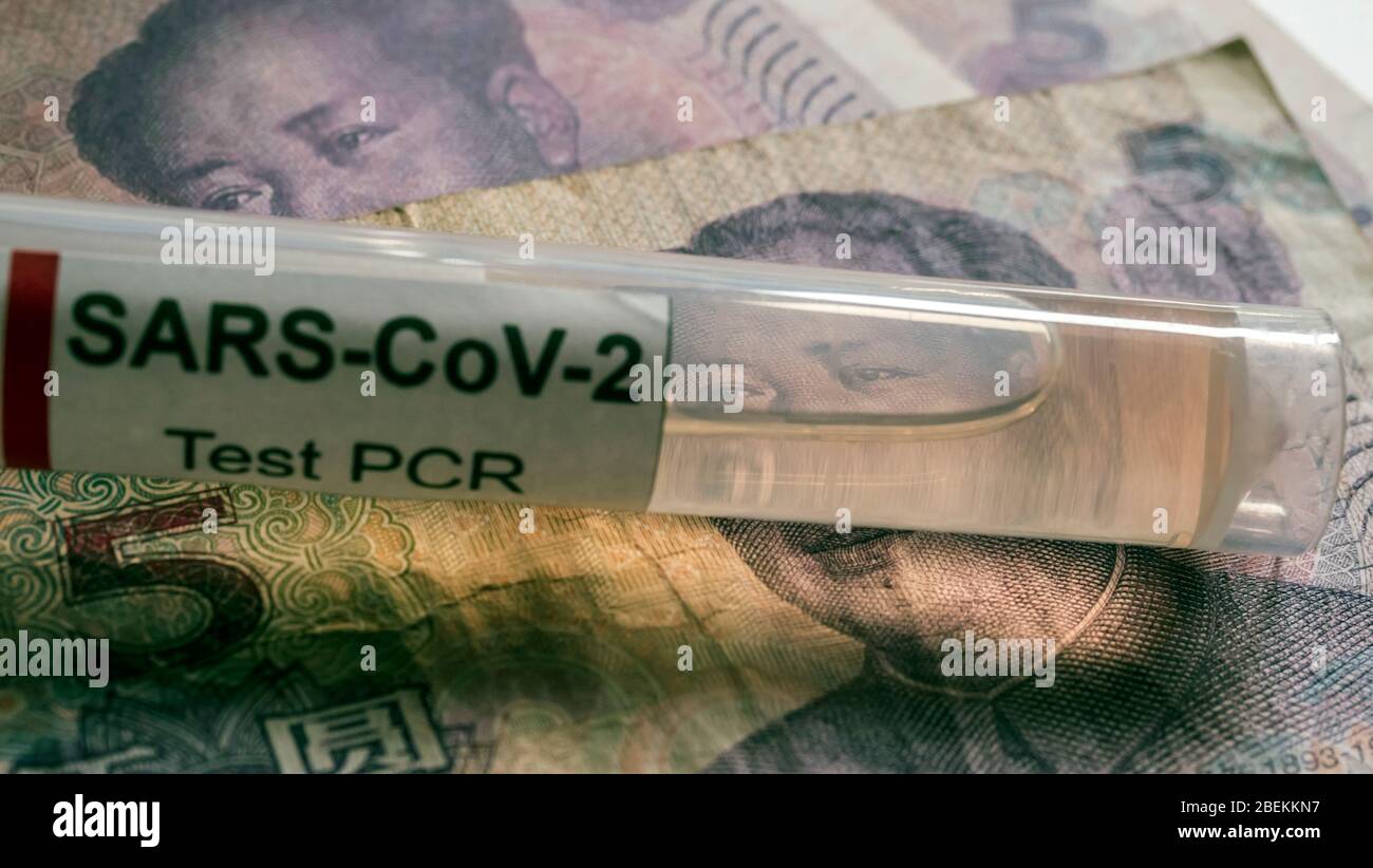 Coronavirus vial on Chinese banknotes, conceptual image Stock Photo