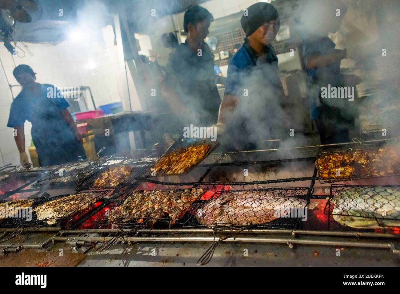 Horizontal view of a huge barbeque at a seafood restaurant in Bali, Indonesia. Stock Photo