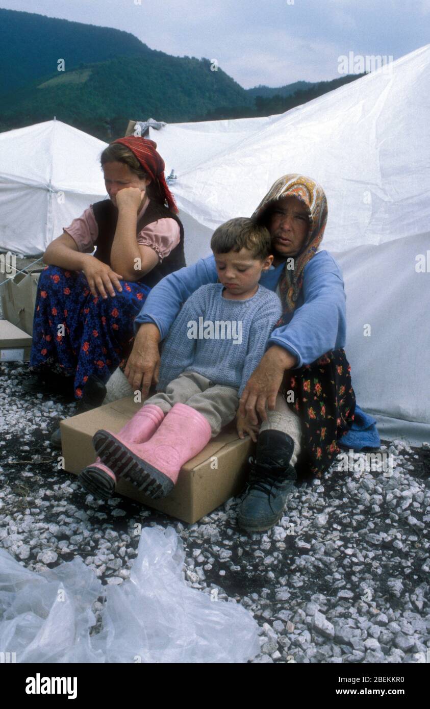 1995 Zenica, Bosnia - grandmother, daughter and child from same family of refugees who fled the fighting in Zenica find refuge in a United Nations temporary refugee camp near Zenica Stock Photo