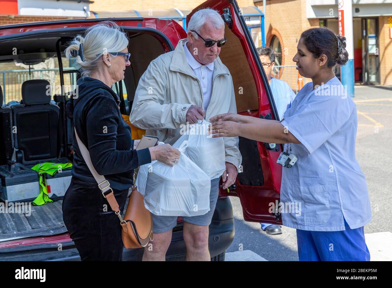 Brentwood, Essex, UK. 14th April 2020. Dusk restaurant in Brentwood, Essex, prepares free meals for NHS frontline workers which are distributed across hospitals by volunteers. Credit: Ricci Fothergill/Alamy Live News Stock Photo