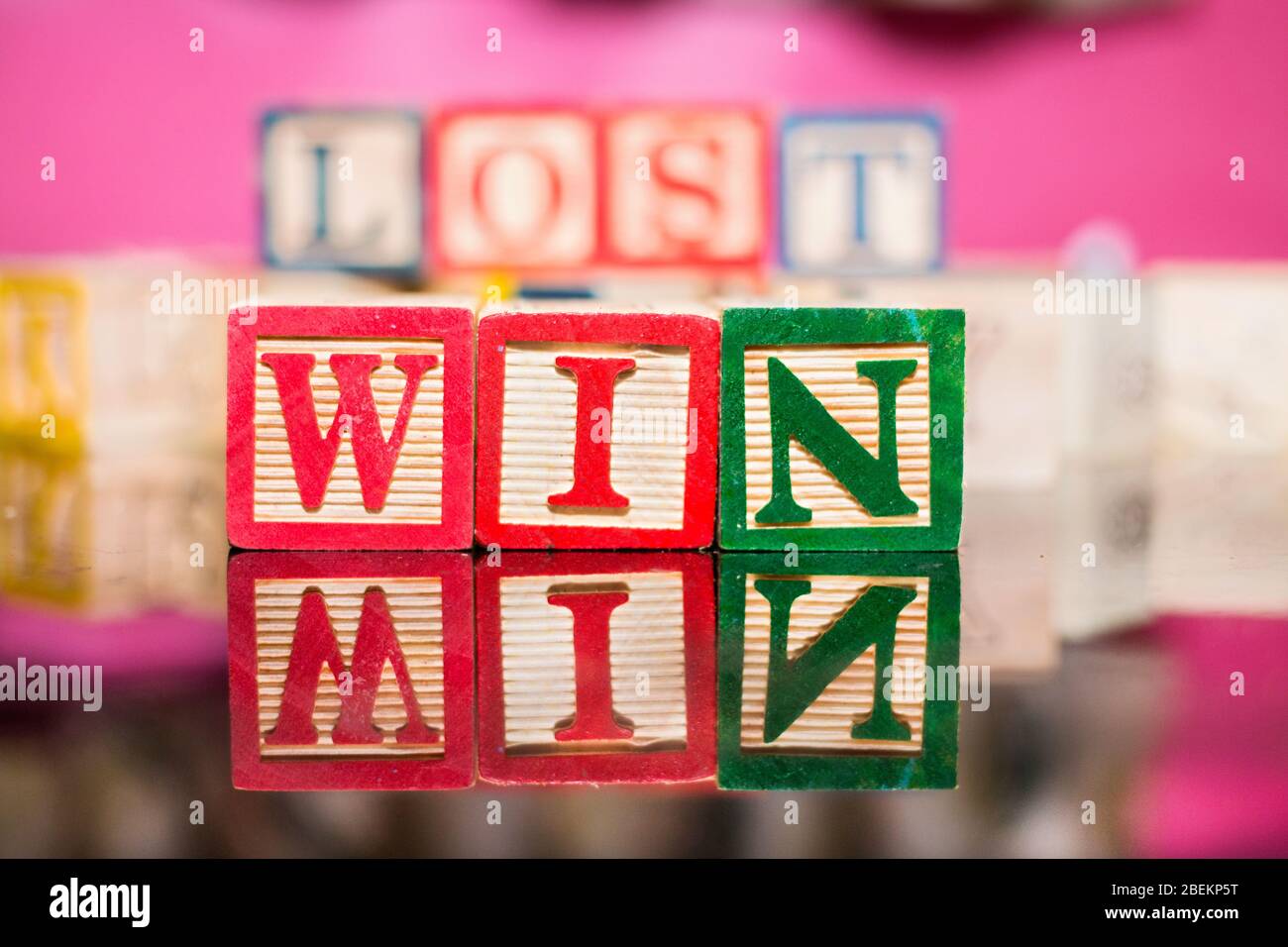 colourful win block letters for playing kids,concept,creative,win,creative ideas,letters,different colour letters,concept photography,pradeep Stock Photo