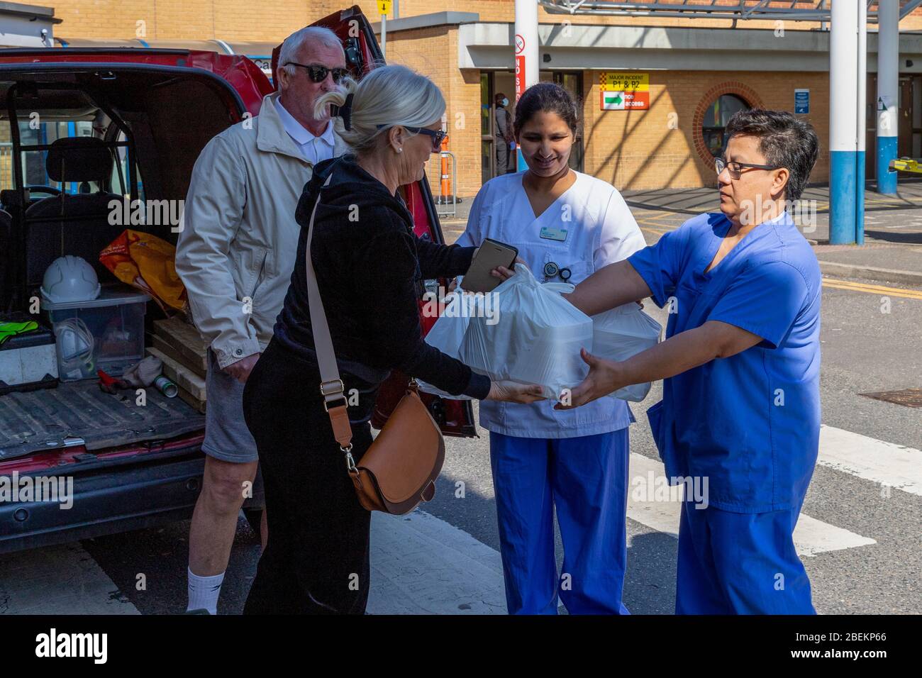 Brentwood, Essex, UK. 14th April 2020. Dusk restaurant in Brentwood, Essex, prepares free meals for NHS frontline workers which are distributed across hospitals by volunteers. Credit: Ricci Fothergill/Alamy Live News Stock Photo