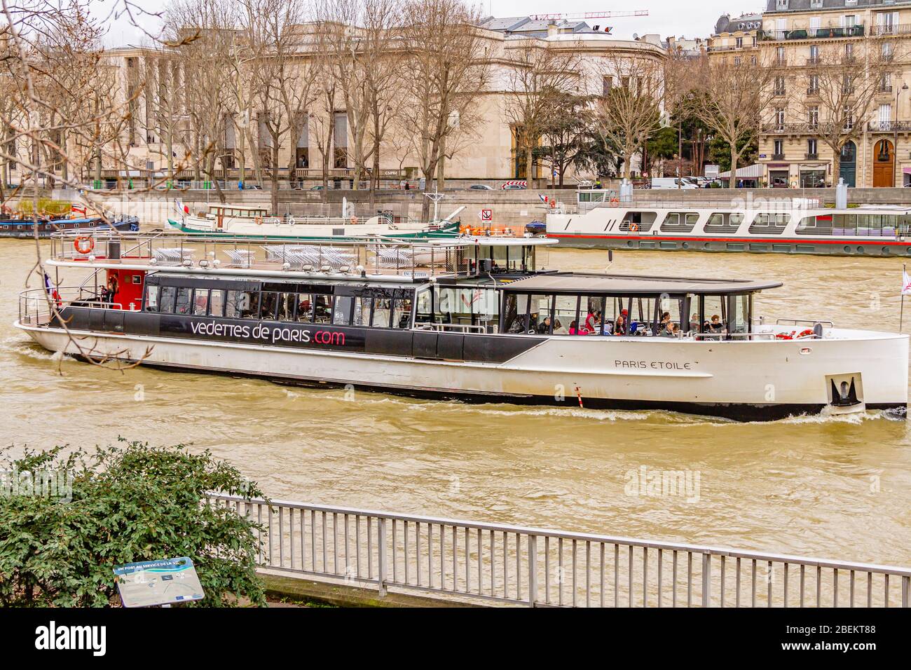 The sightseeing riverboat Paris Etoile on the River Seine in winter. Paris, France. February 2020. Stock Photo