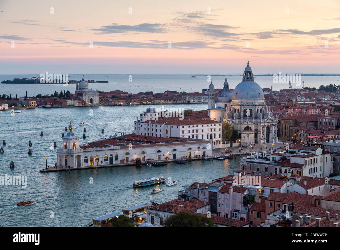 View of the Basilica di Santa Maria della Salute at sunset as seen from ...
