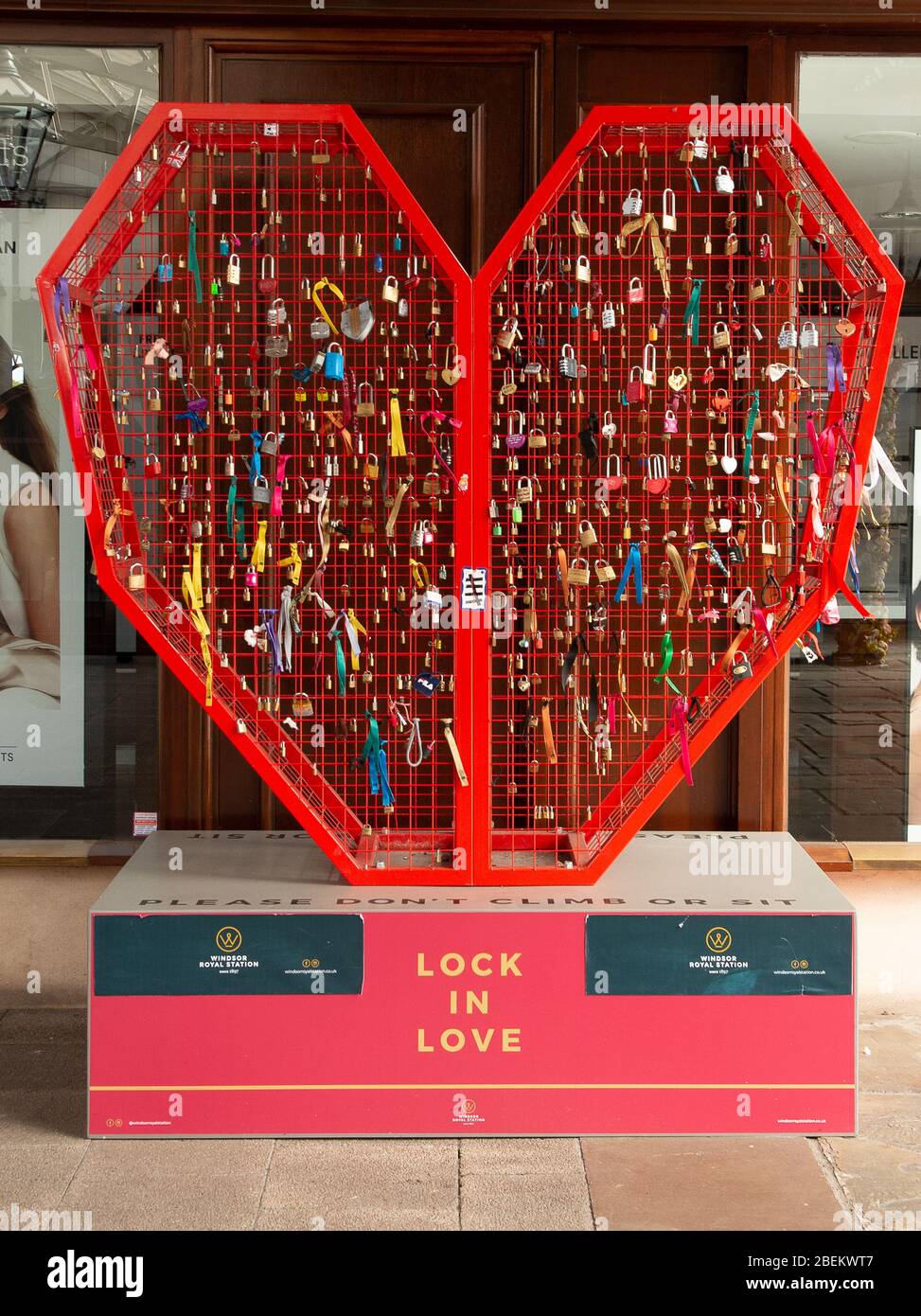 Windsor, UK. 13th Apr, 2020. A sign of hope and love as people lock padlocks onto a large heart shaped metal stand 'Lock in Love' at Windsor Royal Station Shopping Centre in Windsor. Credit: Maureen McLean/Alamy Stock Photo