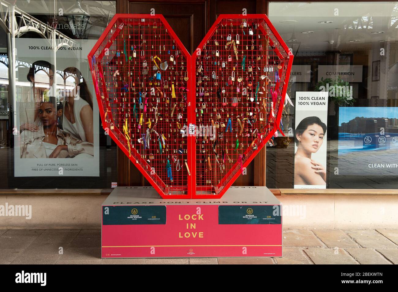 Windsor, UK. 13th Apr, 2020. A sign of hope and love as people lock padlocks onto a large heart shaped metal stand 'Lock in Love' at Windsor Royal Station Shopping Centre in Windsor. Credit: Maureen McLean/Alamy Stock Photo