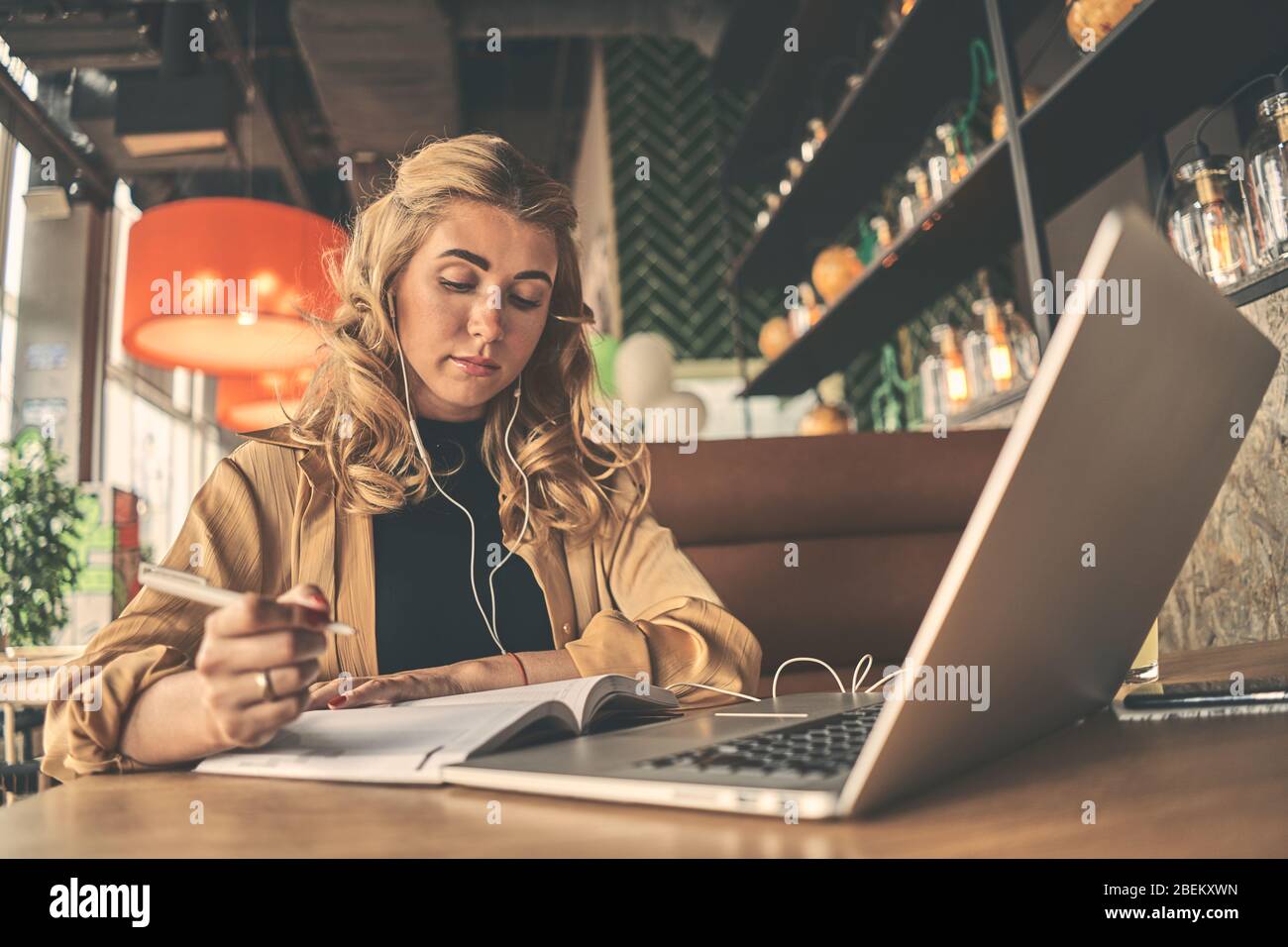 Woman use computer at cafe Stock Photo - Alamy