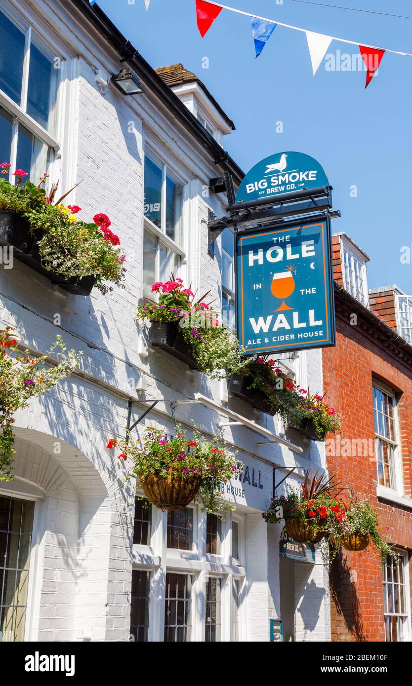 View of St Martin's Street and the Hole in the Wall Ale & Cider House in Chichester, a city in and county town of West Sussex, south coast England, UK Stock Photo