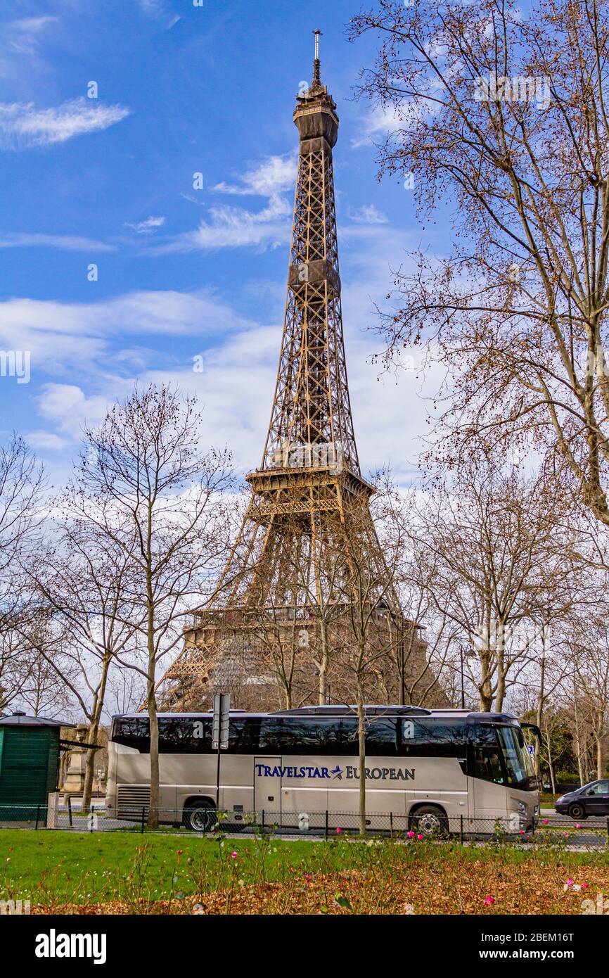 A Travelstar European coach parked near the Eiffel Tower in Paris, France. February 2020. Stock Photo