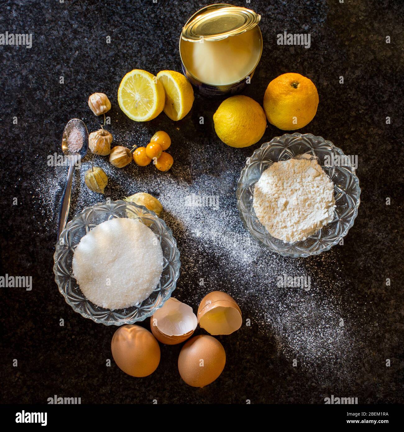 Various dessert ingredients including eggs, sugar, flour, gooseberries
