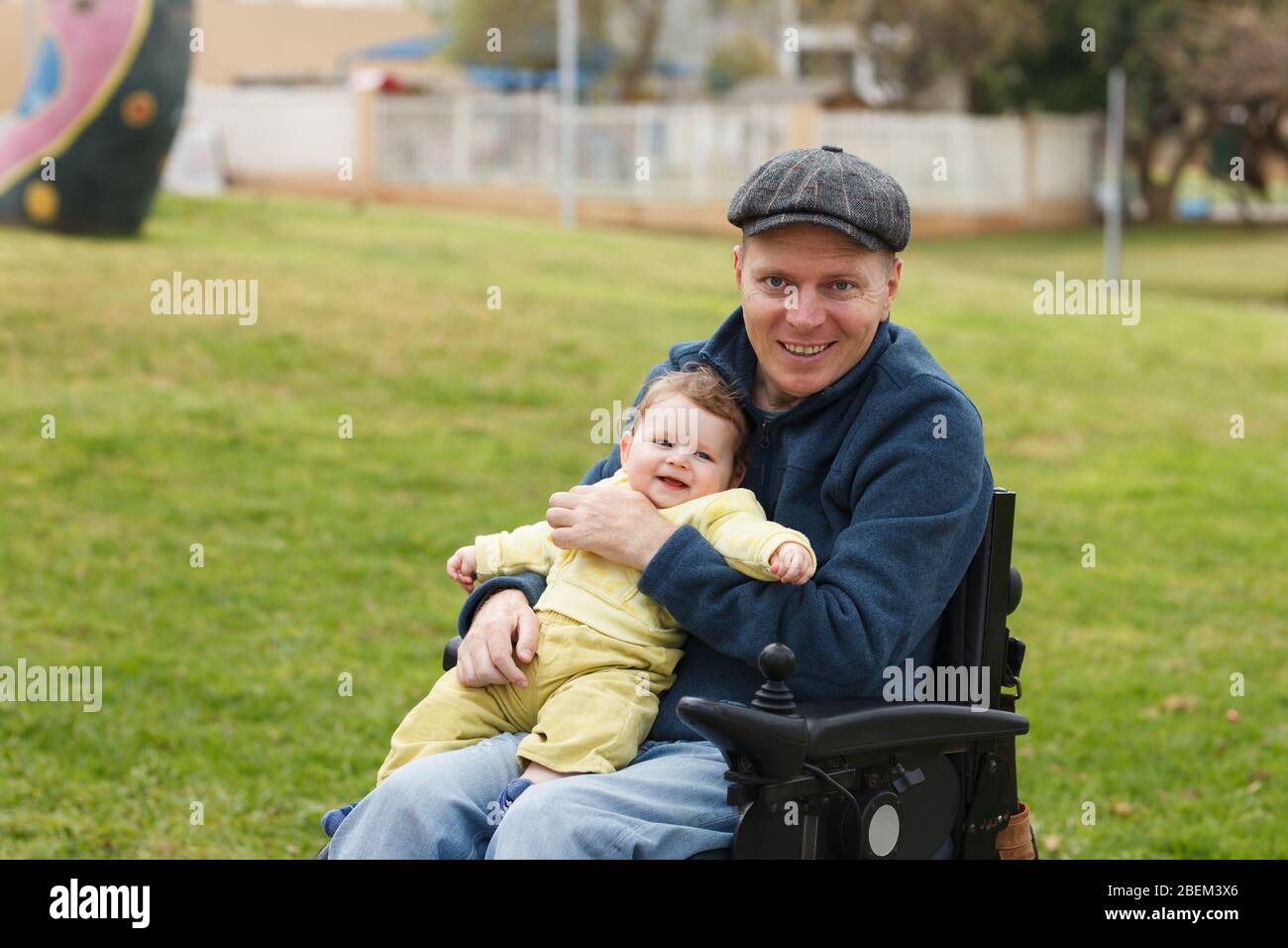 Disabled father play with his little son Stock Photo
